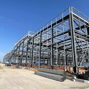 Hangar de estructura de acero prefabricado Cobertizo de metal barato Almacén de construcción de acero para Taller de almacenamiento de garaje de aviones - Product Image 1