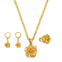 Ensemble collier et boucles d'oreilles tendance en cuivre à motif fleur d'hibiscus hawaïenne pour femme, inspiré des cadeaux de mariage de Guam, de la Micronésie et des îles Marshall