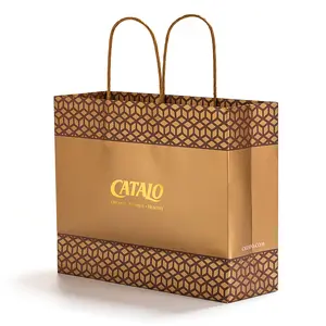 उच्च गुणवत्ता मुद्रित लोगोस मैट पेपर शॉपिंग बैग कपड़े जूते पैकेजिंग फूल पैकिंग कागज बैग रिबन हैंडल के साथ