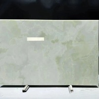 Comptoir de cuisine et de salle de bain en marbre onyx de qualité supérieure AAA, style crème moderne, tons verts clairs et doux, éclaircissant l'espace.