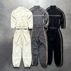 Survêtement unisexe personnalisé coupe évasée style football ample en polyester/nylon avec cordon de serrage, coupe-vent imprimé pour sports d'hiver - Product Image 1