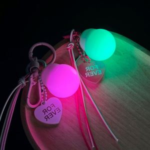 Wholesale 15 Color LED Keychain Glowing Light up <b>Bag</b> <b>Charm</b> with Clip Ring Tassel for Handbag Purse Backpack - Product Image 1
