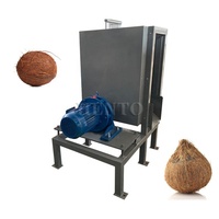 Machine à éplucher les cosses de noix de coco à performances stables/décortiqueuse de noix de coco/machine à éplucher les cosses de noix de coco