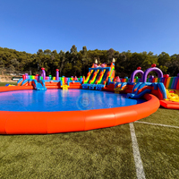 Grande piscine gonflable orange en forme de bonbon avec toboggan pour l'extérieur