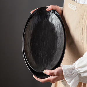 Assiette de poisson à vapeur en céramique texturée en pierre noire de 12/14 pouces Assiettes profondes ovales extra larges Vaisselle occidentale Vaisselle en grès pour hôtel - Product Image 1