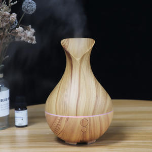 Mini humidificador con diseño de madera, 0.5L, alimentado por USB, con temporizador, para uso doméstico. - Product Image 1