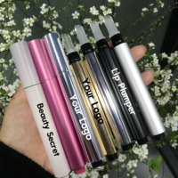 Gloss à lèvres repulpant extrême saveur épicée avec peptides, SPF 30, applicateur métallique rose, effet repulpant