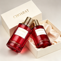 Großhandel Beliebtes Design Elegante Rubinrote Runde Parfümflasche 100ml Luxuriöse Glas-Duftflasche für Damen