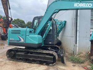 Excavatrice sur chenilles Kobelco SK75 Super, équipement de construction hydraulique vert - Product Image 1