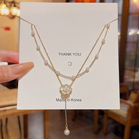 Collier XL299 de luxe léger, design de niche, double couche, camélia, or, diamant, acier inoxydable, pour femme, longue chaîne à pampilles, ras du cou