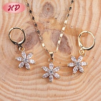 Vente en gros Guangzhou : Parures de bijoux tendance en zircon or rose, collier et boucles d'oreilles plaqués or 18 carats sur mesure pour mariage et anniversaire