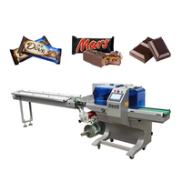 Machine d'emballage plastique automatique à remplissage et scellage contrôlée par PLC pour bonbons, sucettes, barres protéinées, barres énergétiques, barres chocolatées