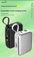 PD22.5W Batterie externe à charge rapide Type-C haute capacité double câble intégré Chargeur portable pour le voyage