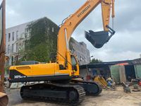 Excavatrice Hyundai 215vs d'occasion à vendre, en excellent état, d'origine usine, très demandée