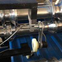 Machine de formage à froid de tôles de toiture double couche de haute qualité pour tuiles trapézoïdales IBR et tôles de toiture à double couche