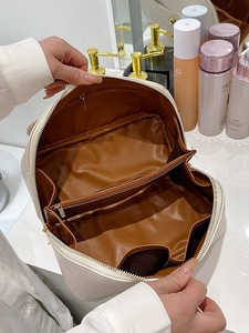 Durable <b>Large</b>-Capacity Hand-Held Makeup Bag with Zipper Closure Waterproof & Portable for Outdoor Travel Cosmetics Storage - Product Image 4