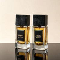 Flacon de parfum carré transparent personnalisé de 50 ml avec pompe vaporisateur et boîte d'emballage sérigraphiée