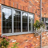 Ventana de Aluminio Gris Personalizada con Marco Curvo de 3 Paneles, Rejilla Francesa, Aislamiento Térmico y Vidrio de Ahorro Energético
