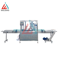 Ligne de production entièrement automatique de remplissage de gaz en aérosol pour produits cosmétiques et chimiques – Machines de remplissage à pompe haute efficacité pour canettes et bouteilles