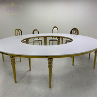 Table à manger moderne en forme de serpent avec cadre en acier inoxydable doré et plateau en MDF blanc, multifonctionnelle pour hôtel et usage domestique