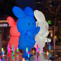 Ornement paysager géant gonflable en forme de lapin floral, éclairé, résistant à l'eau, alimenté par prise, pour scène aquatique de rue commerciale nocturne