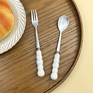 Ensemble de fourchettes et cuillères à dessert en perles de haute qualité avec manche en céramique, couverts blancs en acier inoxydable - Product Image 5