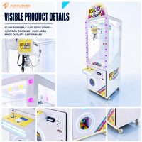 Machine à griffes commerciale d'arcade, jeu de grue à monnayeur, distributeur de cadeaux avec éclairage LED sur le bord et base mobile sur roulettes