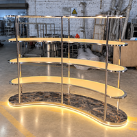 Vitrine de présentation de bijoux sur mesure en acier inoxydable doré avec verre trempé et éclairage LED pour la vente au détail