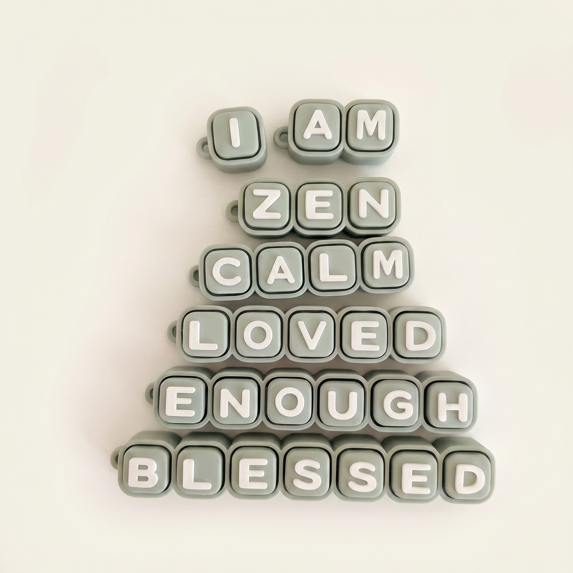 Sage green-white text