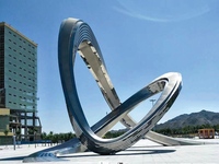 Grande sculpture en acier inoxydable en forme de fleur circulaire décorée pour l'extérieur