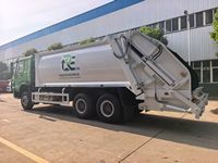 Camion benne à ordures SINOTRUK 6x4 23CBM à chargement arrière, benne hydraulique robuste avec élévateur suspendu