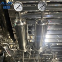 Machine à parfum mélangeur pneumatique en acier inoxydable équipement de filtre machine de congélation d'huile essentielle de parfum