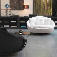Chaise de canapé causeuse ronde simple avec table pour le salon, le salon, la maison et la villa.