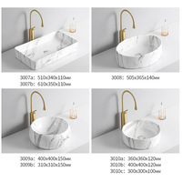 Lavabo de comptoir en céramique avec 5 ans de garantie et poignée unique pour les projets de toilettes d'hôtel et de villa