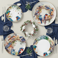 Service de table de luxe en céramique avec bordure dorée et motif oiseau aquarelle, comprenant assiettes en porcelaine fine et service à thé et café avec tasses et soucoupes