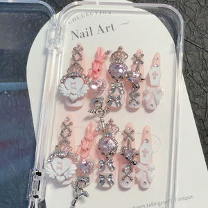 Uñas postizas Honey Butter Y2k Chic Gothic de alta resistencia con purpurina, nudo de mariposa en relieve, cruz pequeña y hechas a mano. - Product Image 4