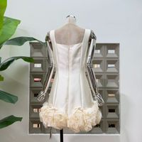 Vente en gros de vêtements de boutique pour l'été, nouvelle robe élégante à col rond sans manches avec nœud papillon en patchwork