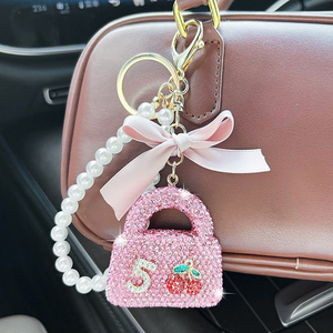 Porte-clés Sac Diamant Complet Créatif avec Chaîne de Perles et Nœud, Pendentif Diamant Brillant Personnalisé Exquis pour Voiture - Product Image 5