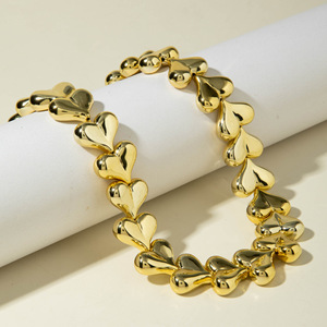 Collier court fantaisie pour femme, style punk, avec nœud doré, cœur de pêche et coquillage, bijou de fête exagéré, vente en gros - Product Image 3