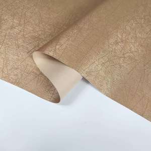 Cuir synthétique PU 0,5 mm Spunlace Bottom Nail Bone World à motif gaufré pour sacs à main, bijoux et lunettes pour femmes - Product Image 1