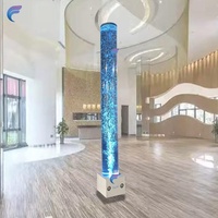 Tube vertical hautement transparent, affichant clairement les bulles montantes et les poissons décoratifs flottants, résistant aux rayures et durable