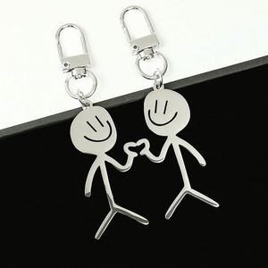 Porte-clés mignon en acier inoxydable en forme de couple avec dessin simple pour visage, pendentif mousqueton en forme de personnage - Product Image 2