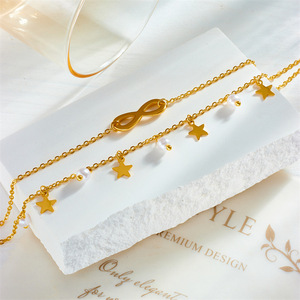 Bracelet de cheville empilable Forever Symbol en acier inoxydable plaqué or avec breloques étoile à cinq branches et perle blanche, délicat pour le quotidien - Product Image 3