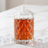 Bouteille en verre de vodka personnalisée avec motif en relief, 700 ml, 750 ml, bouteilles à spiritueux transparentes rondes en verre silex, vente en gros