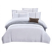 Parures de lit personnalisées pour hôtels et maisons d'hôtes – Ensembles quatre pièces de draps et housses de couette en coton pur tricoté et teint, grammage lourd