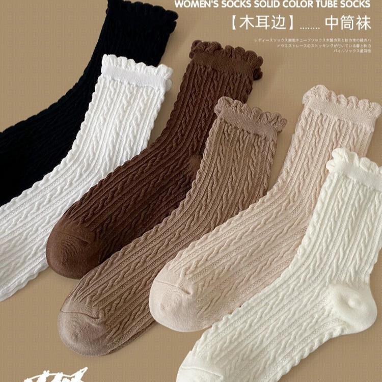 Women's mid-length solid color twisted top