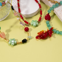 Collier tendance en agate rouge naturelle œil de chat avec perles, pendentif en céramique fleur et hippocampe, style bohème