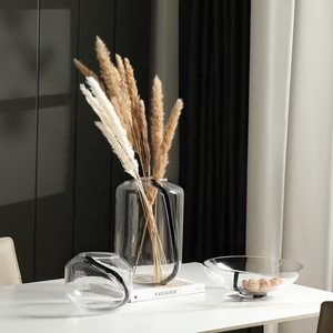 <span class=keywords><strong>Vase</strong></span> en <span class=keywords><strong>verre</strong></span> de cristal clair minimaliste moderne ligne noire Vases à fleurs décoratifs pour la décoration intérieure et la décoration de mariage - Product Image 1