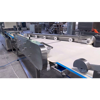 Ventes chaudes, machine à pain au beurre Tongguan à haute efficacité, ligne de production, contrôle PLC, acier inoxydable 304, capacité de 2000 à 6000 pièces/heure