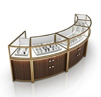 Comptoir d'exposition de montres en verre trempé LED de luxe avec finition marbre/personnalisable, design moderne pour la vente au détail haut de gamme